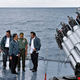 In this June 23, 2016 file photo released by the Indonesian Presidential Office, Indonesian President Joko Widodo, third right, accompanied by, from left to right, Cabinet Secretary Pramono Anung, Navy Chief of Staff, Adm. Ade Supandi, top Security Minister Luhut Panjaitan, Armed Forces Chief Gen. Gatot Nurmantyo and Riau Islands Gov. Nurdin Basirun stands on the deck of navy warship KRI Imam Bonjol, on the waters of Natuna Islands, Indonesia. Indonesia doesn’t have a territorial dispute with China, but Beijing’s nine-dash line, which signifies its claims, overlaps with Indonesia’s internationally recognized exclusive economic zone extending from the Natuna islands.